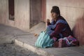 Unidentified indigenous native Quechua woman with traditional tribal clothing and hat, at the Tarabuco Sunday Market, Bolivia Royalty Free Stock Photo